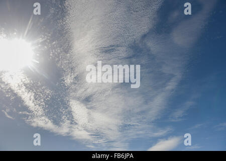 A view of cirrus clouds in a clear blue sky Stock Photo