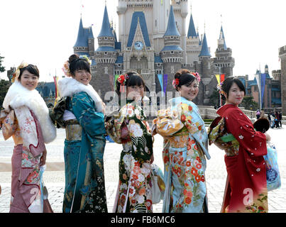 Tokyo, Japan. 11th Jan, 2016. Japanese girls wearing kimonos pose for pictures at Disneyland in Tokyo, Japan, Jan. 11, 2016. People who turned 20-year-old took part in the annual Coming-of-Age Day ceremony in Japan on Monday. © Ma Ping/Xinhua/Alamy Live News Stock Photo