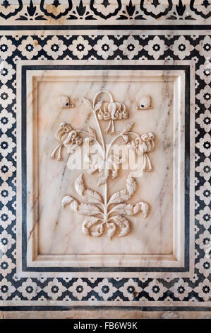 Flower relief on marble indian decoration Stock Photo