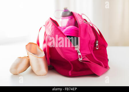 close up of pointe shoes and sports bag Stock Photo