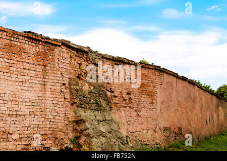 fence from an old brick Stock Photo