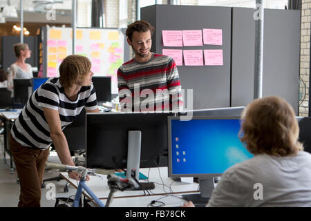 Colleagues working in office Stock Photo
