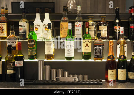 Bottles of spirits behind the bar in an Aberdeen hotel - Aberdeen, Scotland, UK. Stock Photo