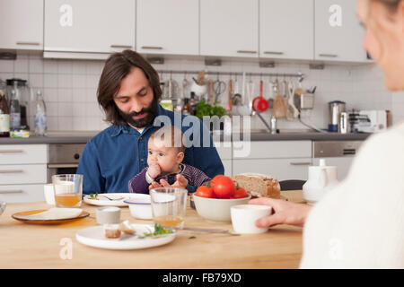 Family having breakfast at home Stock Photo