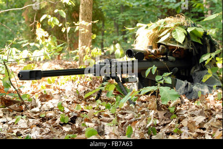 A U.S. Army sniper using an M107. Sniper with Barrett M82 Stock Photo