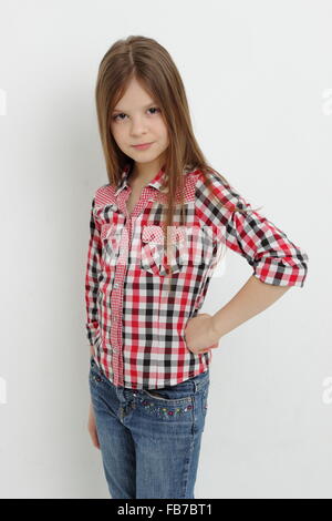 Beautiful American little girl as a cowgirl Stock Photo