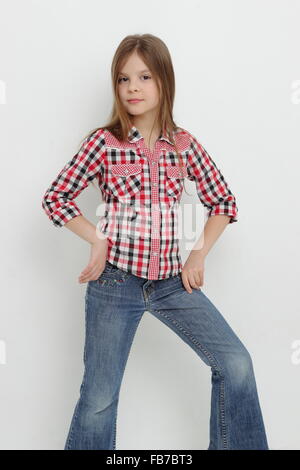 Beautiful American little girl as a cowgirl Stock Photo