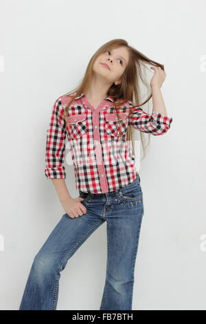 Beautiful American little girl as a cowgirl Stock Photo