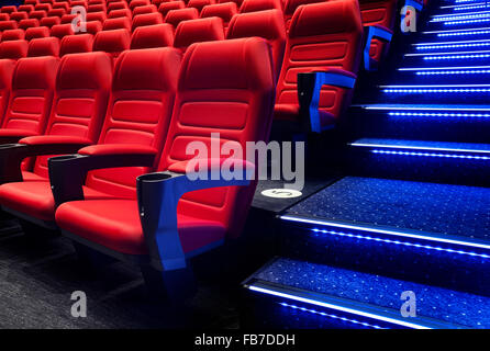 Empty rows of red theater or movie seats Stock Photo
