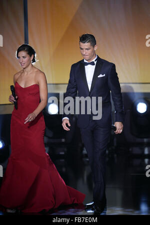 Zurich, Switzerland. 11th Jan, 2016. Soccer player Carli Lloyd (L) of United States and Real Madrid's Cristiano Ronaldo of Portugal attend the FIFA Ballon d'Or Gala 2015 held at the Kongresshaus in Zurich, Switzerland, 11 January 2016. Photo: Patrick Seeger/dpa/Alamy Live News Stock Photo