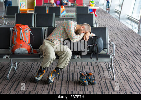 Airport lounge and people waiting for boarding Stock Photo