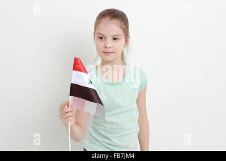 Teen girl holding Syria flag Stock Photo