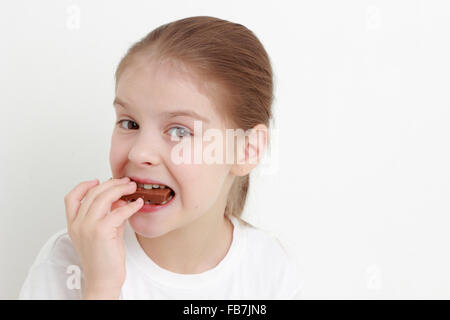 little girl and chocolate Stock Photo