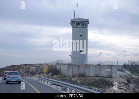 ISRAEL, West Bank. 11th  January, 2016. An IDF military pillbox overlooking the road leading to Israeli settlements near Jerusalem in the northern West Bank Israel on 11 January 2016  The international community considers Israeli settlements in the West Bank illegal under international law, but the Israeli government disputes this. Credit:  Eddie Gerald/Alamy Live News Stock Photo