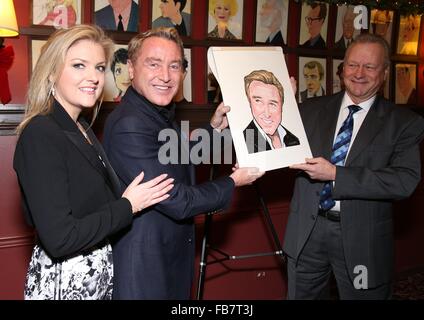 Michael Flatley portrait unveiling at Sardi's theatre district eatery  Featuring: Niamh O'Brien, Michael Flatley, Max Klimavicius Where: New York City, New York, United States When: 11 Dec 2015 Stock Photo