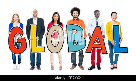 Multi-Ethnic Group of People Holding Text Global Stock Photo