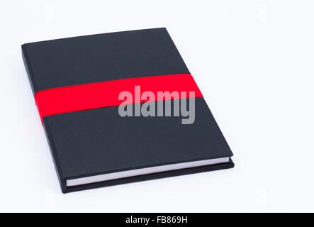Image shows a notebook isolated on white background Stock Photo