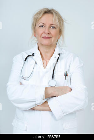 a doctor in a white coat with a stethoscope Stock Photo