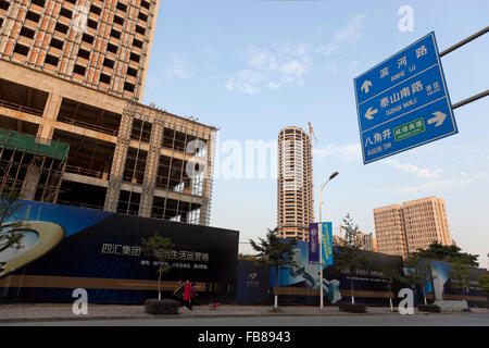 High-rise buildings are rising rapidly in cities throughout China's hinterland. Stock Photo