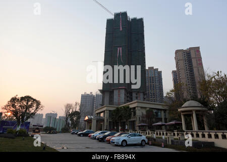 Clusters of residential highrises being constructed in a small typical city in China. Stock Photo
