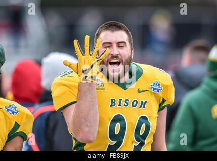 January 9th, 2016:.North Dakota State Bison defensive tackle Nate Tanguay (99) shows 5 fingers as they win 5 National Championships during the FCS National Championship game between the Jacksonville State Gamecocks and the North Dakota State Bison at the FCS Championship at Toyota Stadium in Frisco, Texas.North Dakota wins its 5th straight FCS National Title by a score of 37-10.Manny Flores/Cal Sport Media Stock Photo