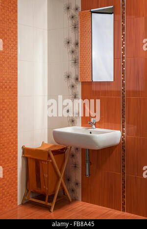 detail of modern private bathroom interior in orange Stock Photo
