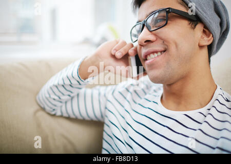 Handsome guy speaking on cellphone Stock Photo