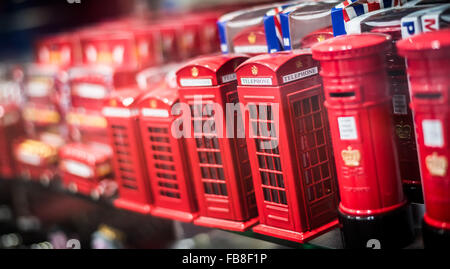 Various red iconic, nostalgic British items for sale in tourist shop. Stock Photo