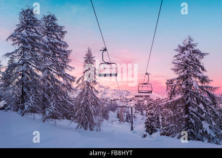 Winter mountains panorama with ski slopes and ski lifts near Vogel ski center, Slovenia Stock Photo