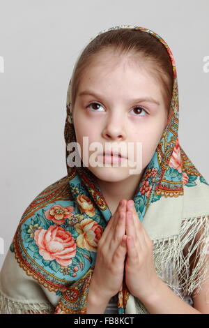 russian little girl in traditional skarf Stock Photo