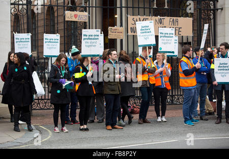 Paddington, London, UK. 12th January, 2016. Junior Doctors are Striking today Against Planned Changes to their Working Conditions. The junior doctors were handing out stickers today at the picket lines for people to show their support for their cause. Junior doctors are protesting against planned government changes to the working conditions and pay for junior doctors. Credit:  Jane Campbell/Alamy Live News Stock Photo