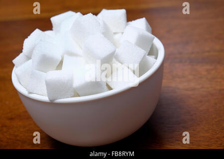 white granulated sugar cubes lumps Stock Photo