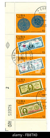 CUBA - CIRCA 1975: A stamp printed in Cuba shows image of dedicated 25 aniversare The Central Bank of Cuba. Stock Photo