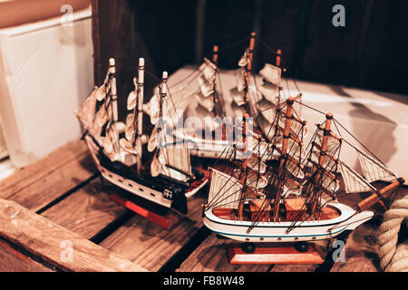 Handmade wooden toy ships close up. Stock Photo