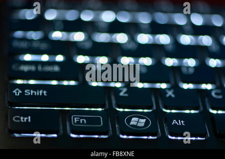 Illuminated keyboard. Focus on Ctrl Fn Alt keys. Shallow depth of field Stock Photo