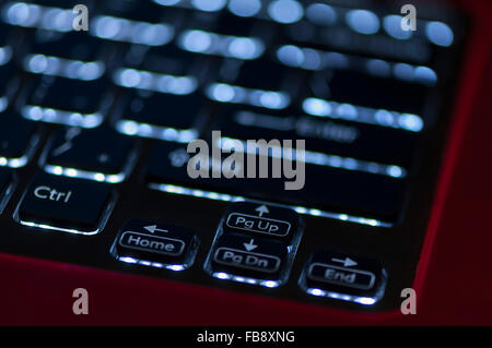 Illuminated keyboard. Focus on arrow keys. Shallow depth of field Stock Photo
