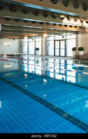 Modern indoor swimming pool in a hotel & leisure complex - Aberdeen, Scotland. Stock Photo