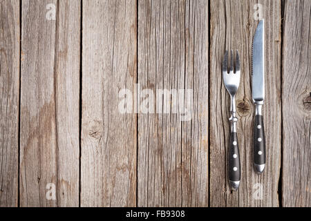 Silverware on wooden table. Top view with copy space Stock Photo
