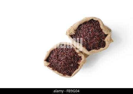 red rice in sack bag Stock Photo - Alamy