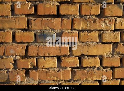 Old worn brick wall Stock Photo