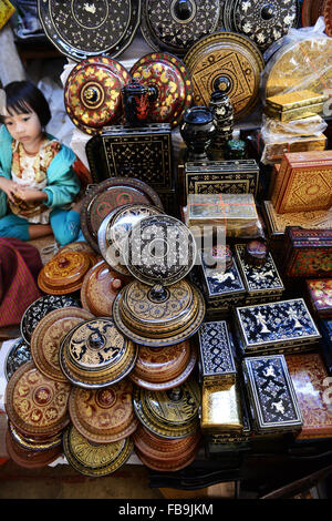 Traditional Burmese lacquerware shops in the corridor leading to the Shwezigon Paya pagoda in Bagan. Stock Photo