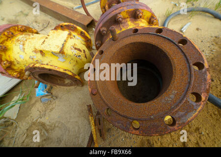 Rusty pipes. Dump. Northern part of Sakhalin Island, Russia, sand spit Piltun. Stock Photo