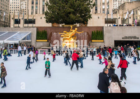Lower Plaza of Rockefeller Center with ice skating rink and Christmas tree, Manhattan, New York, USA Stock Photo