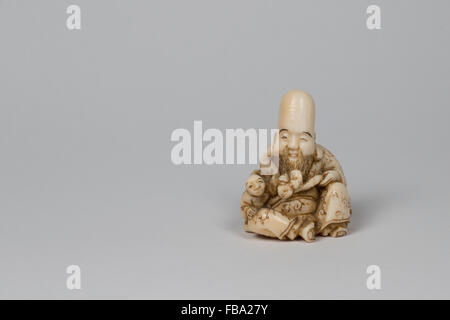 Antique Japanese netsuke, carved in Ivory Stock Photo