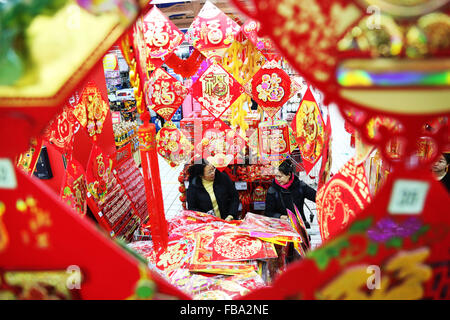 Shenyang, China's Liaoning Province. 13th Jan, 2016. People buy Chinese knots for Lunar New Year celebration at a supermarket in Shenyang, capital city of northeast China's Liaoning Province, Jan. 13, 2016. © Long Lei/Xinhua/Alamy Live News Stock Photo