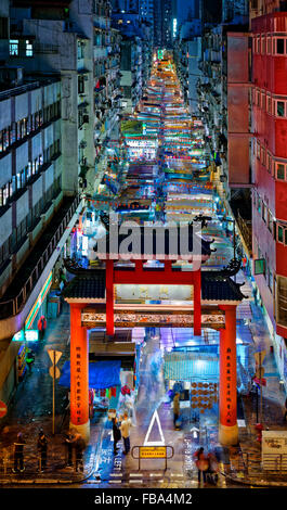 HONG KONG, CHINA - DEC 27, 2015: Crowded people walk through the market on December 27, 2015 in Mong Kok, Hong Kong. Mong Kok, H Stock Photo