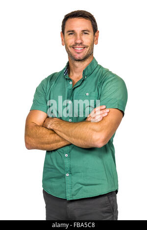 Smiling man with arms crossed Stock Photo