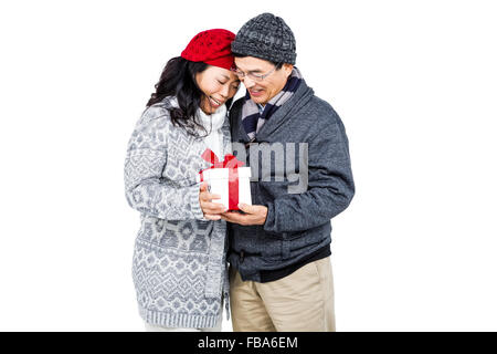 Happy couple with gift Stock Photo