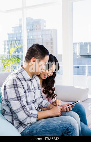 Young couple using smart phone Stock Photo