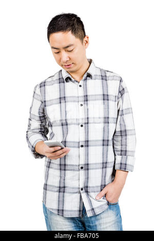 Young man using smart phone Stock Photo